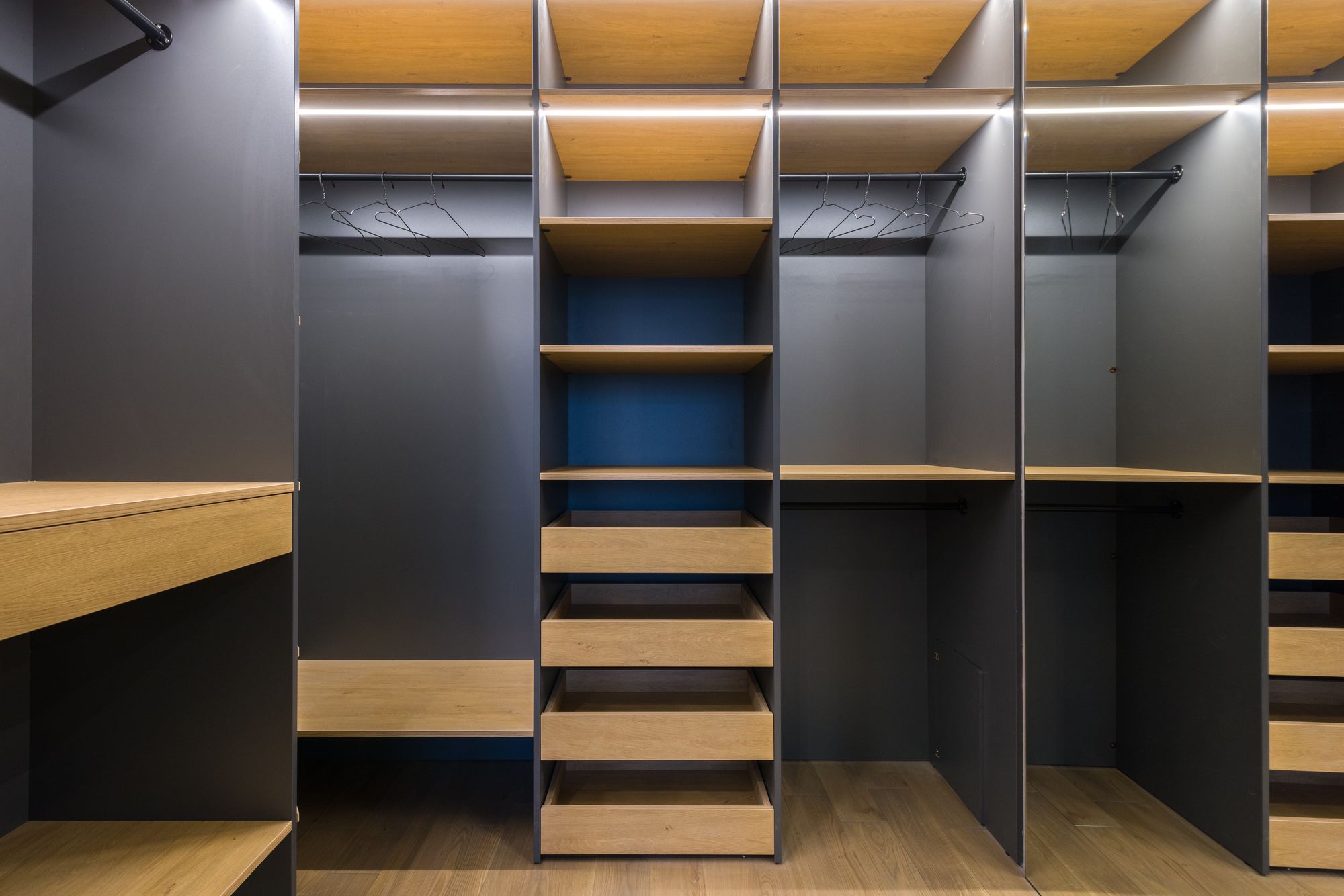 After: custom charcoal closet with integrated lighting