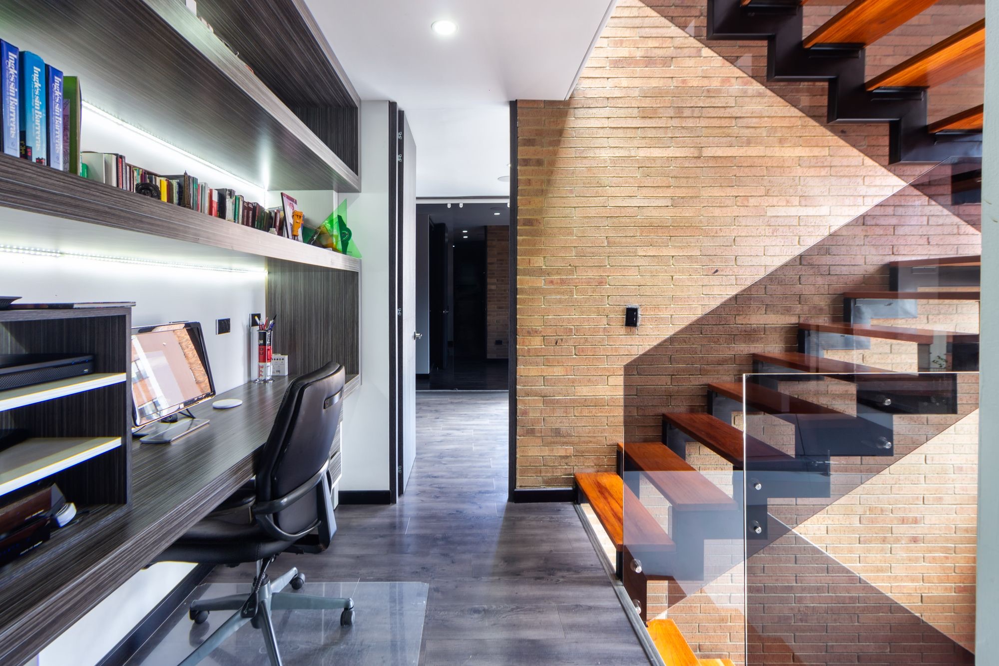 Home office wall with integrated shelving